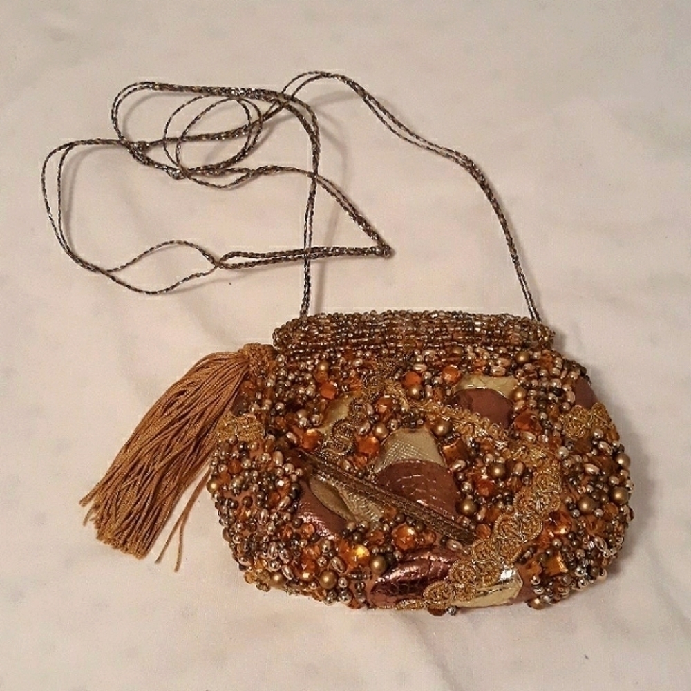 Vintage Grace Ann Agostino handmade beaded leather mini bag.